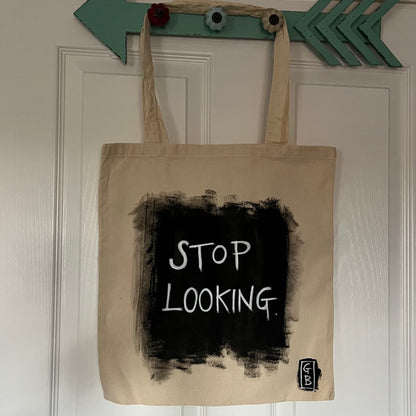 ‘Stop looking’ cotton Tote bag